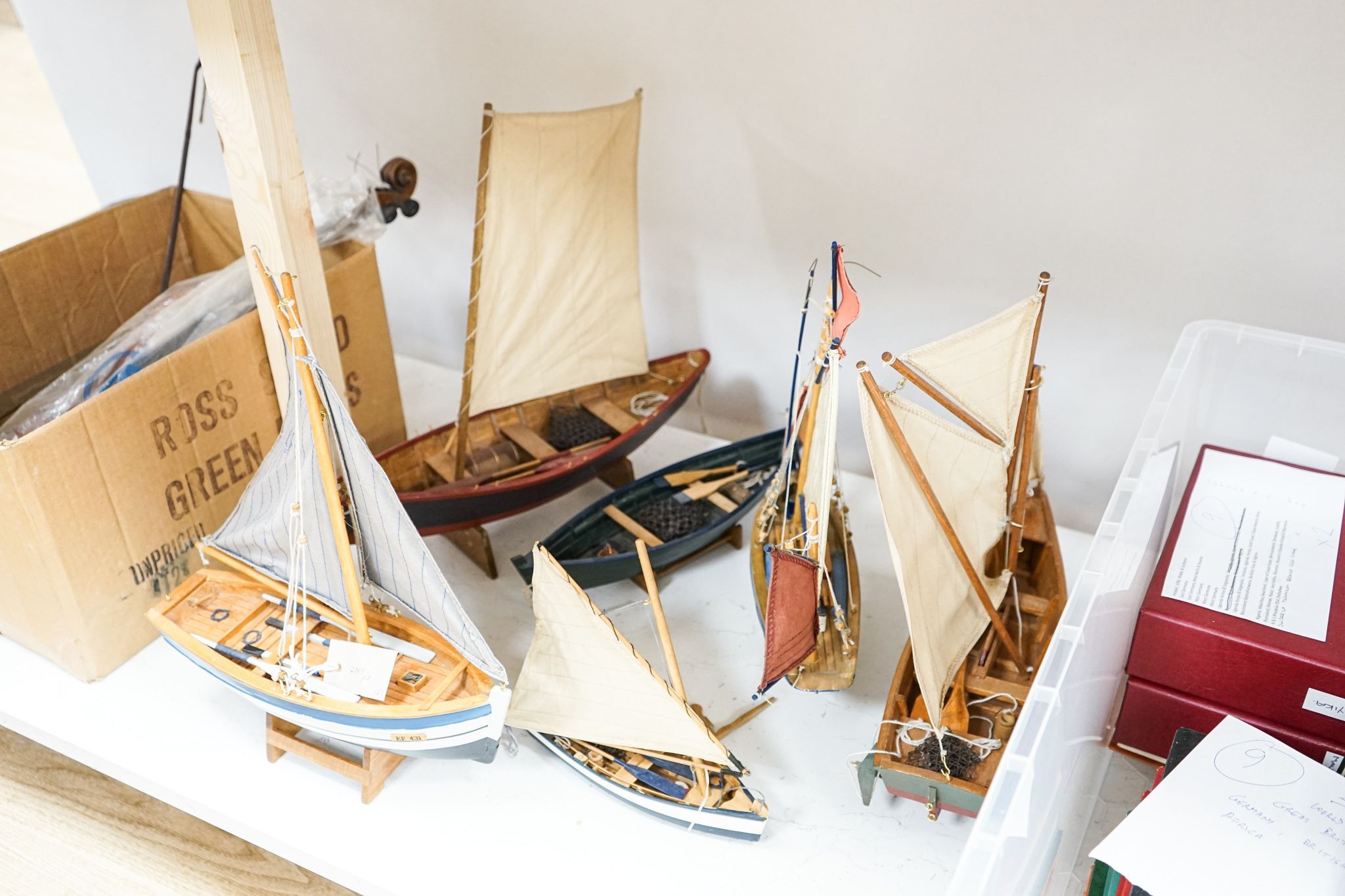 A group of six painted wood boat models